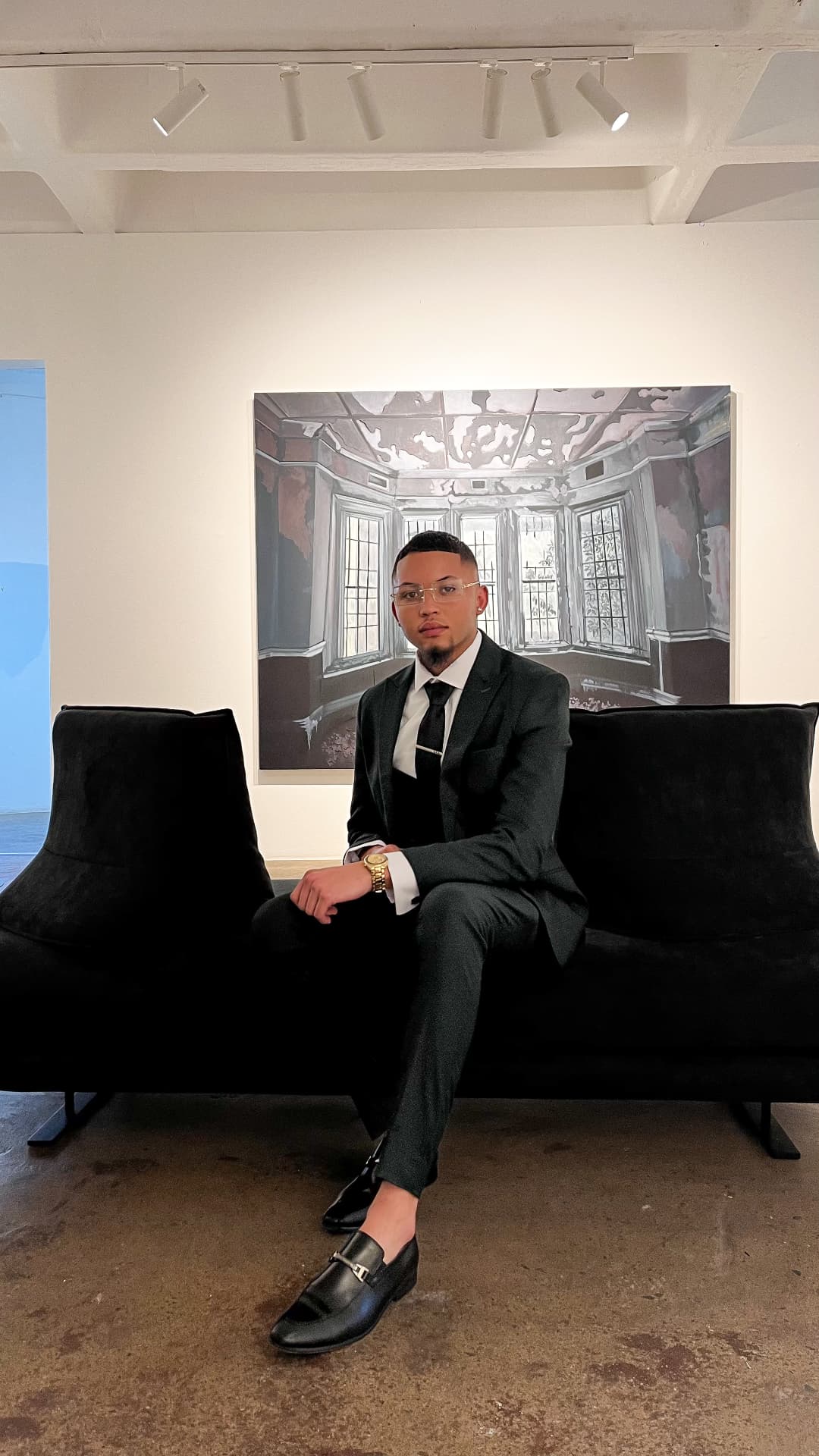 Keanu Buys, founder of Sentinel Pipeline, seated in a gallery space